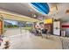 Spacious garage with an open door, showcasing ample space for storage and hobbies with organized tools at 2882 Ophelia Way, Myrtle Beach, SC 29577