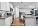 Open kitchen with granite countertops, stainless appliances, a breakfast bar, and convenient access to dining area at 2882 Ophelia Way, Myrtle Beach, SC 29577