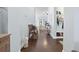 Inviting hallway with beautiful hardwood floors, neutral walls and decor leading to the living areas at 308 Firenze Loop, Myrtle Beach, SC 29579
