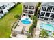 Aerial view of a stunning property with a private pool, lush landscaping, and outdoor entertaining areas at 337 St. Julian Ln., Myrtle Beach, SC 29579