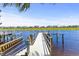 Scenic view of a wooden pier and dock, providing direct access to the waterway and boating opportunities at 337 St. Julian Ln., Myrtle Beach, SC 29579