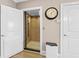 A modern home featuring a convenient residential elevator with wooden interior at 337 St. Julian Ln., Myrtle Beach, SC 29579
