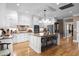 Well-lit kitchen with granite counters, stainless steel appliances and plenty of seating at 337 St. Julian Ln., Myrtle Beach, SC 29579