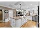 Open kitchen design with stainless steel appliances, granite countertops, and custom cabinetry at 337 St. Julian Ln., Myrtle Beach, SC 29579