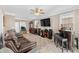 A stylish living room boasts a cozy seating area, entertainment center, and a bar for relaxation at 337 St. Julian Ln., Myrtle Beach, SC 29579