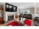 Cozy living room with a fireplace and large television at 337 St. Julian Ln., Myrtle Beach, SC 29579