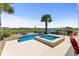 An in-ground pool and attached hot tub, ideal for outdoor relaxation and entertaining friends at 337 St. Julian Ln., Myrtle Beach, SC 29579