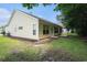 Spacious backyard featuring a well-maintained lawn and a patio perfect for outdoor entertainment and relaxation at 364 Vesta Dr., Myrtle Beach, SC 29579