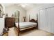 Bright bedroom with a four-poster bed frame, a window and a closet that offers an inviting atmosphere at 364 Vesta Dr., Myrtle Beach, SC 29579