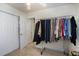 Walk-in closet with a lot of clothing storage and access to other rooms in the house at 364 Vesta Dr., Myrtle Beach, SC 29579