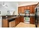 Modern kitchen featuring stainless steel appliances and sleek granite countertops at 364 Vesta Dr., Myrtle Beach, SC 29579