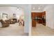 Open-concept living space with a kitchen overlooking a cozy living room with a fireplace at 364 Vesta Dr., Myrtle Beach, SC 29579
