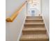 Carpeted stairway leading to the upper level, providing a transition to the home's upper floor at 364 Vesta Dr., Myrtle Beach, SC 29579