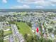 Wide aerial shot of the community showcasing the landscape and highway access at 3700 Golf Colony Lane # 26A, Little River, SC 29566