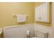 Well-maintained bathroom featuring wainscoting and a toilet at 3700 Golf Colony Lane # 26A, Little River, SC 29566