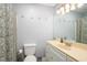 Cozy bathroom featuring a large mirror, updated fixtures, and ample lighting at 3700 Golf Colony Lane # 26A, Little River, SC 29566
