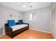 Comfortable bedroom featuring a daybed and a window with natural light at 3700 Golf Colony Lane # 26A, Little River, SC 29566