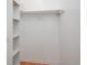 Walk-in closet with installed shelving and plenty of storage space at 3700 Golf Colony Lane # 26A, Little River, SC 29566
