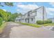 Charming multi-Gathering building featuring a well-maintained yard and ample parking spaces at 3700 Golf Colony Lane # 26A, Little River, SC 29566