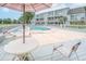 An outdoor pool offers an inviting lounge area perfect for relaxation and socializing at 3700 Golf Colony Lane # 26A, Little River, SC 29566