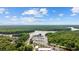 Scenic aerial view of a marina, a waterway, and lush greenery from above at 3772 Brown Bark Ln., Murrells Inlet, SC 29576