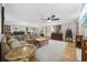 Spacious living room with hardwood floors, comfortable sofa, and ample natural light at 3772 Brown Bark Ln., Murrells Inlet, SC 29576