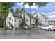 Attractive condo complex with multiple units, light siding, blue trim, and convenient parking at 4344 Spa Dr. # 605, Little River, SC 29566