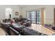Open-concept living room with high ceiling and sliding glass door to outdoor living at 4344 Spa Dr. # 605, Little River, SC 29566