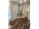 Bathroom showcasing a freestanding tub, walk-in shower, and stylish fixtures at 4806 S Ocean Blvd., Surfside Beach, SC 29575