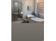 Elegant bathroom showcasing a modern tub, stylish fixtures, and tiled floors at 4806 S Ocean Blvd., Surfside Beach, SC 29575