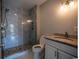 Modern bathroom featuring a glass-enclosed shower and updated vanity at 4806 S Ocean Blvd., Surfside Beach, SC 29575