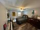 Spacious bedroom with ample natural light and a ceiling fan at 4806 S Ocean Blvd., Surfside Beach, SC 29575