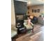 Cozy living room with a stone fireplace and comfortable seating at 4806 S Ocean Blvd., Surfside Beach, SC 29575