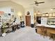 Open living space featuring a kitchen island with a breakfast bar and lots of natural light at 500 Fairway Village Dr. # 9-K, Myrtle Beach, SC 29588