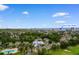 Aerial view featuring a community pool, the beach, nearby golf course and well-kept landscaping at 503 20Th Ave. N # 29-C, North Myrtle Beach, SC 29582