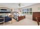 Nicely decorated bedroom featuring a queen bed, bunk beds and large, sunlit windows at 503 20Th Ave. N # 29-C, North Myrtle Beach, SC 29582
