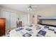 Comfortable bedroom with a queen bed, bunk beds, ceiling fan, and plenty of closet space at 503 20Th Ave. N # 29-C, North Myrtle Beach, SC 29582