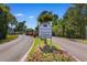 Entrance to Fairway Oaks private community sign with colorful flowers, landscaping and well-kept streets at 503 20Th Ave. N # 29-C, North Myrtle Beach, SC 29582