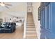 Inviting entryway featuring an open staircase, hardwood floors, a comfortable couch and an open floorplan at 503 20Th Ave. N # 29-C, North Myrtle Beach, SC 29582