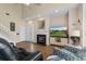 This living room has hardwood floors, a fireplace, and views of the front yard at 503 20Th Ave. N # 29-C, North Myrtle Beach, SC 29582
