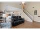 Spacious living room with hardwood floors and an open layout to the kitchen and dining area at 503 20Th Ave. N # 29-C, North Myrtle Beach, SC 29582