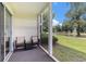 Cozy outdoor patio seating offers views of the lush golf course at 537 White River Dr. # 17C, Myrtle Beach, SC 29579