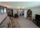 Comfortable living room featuring a ceiling fan, furniture and natural lighting at 5370 Miracle Ln., Conway, SC 29526