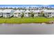Aerial view of the backs of multiple homes next to a small body of water at 540 Chanted Dr., Murrells Inlet, SC 29576