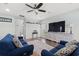 Comfortable living room with blue couches, a ceiling fan and stylish decor at 540 Chanted Dr., Murrells Inlet, SC 29576