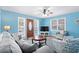 Bright living room featuring comfortable seating, stylish decor, and a ceiling fan for added comfort at 6001- P16A S Kings Highway, Myrtle Beach, SC 29575