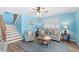 Comfortable living room featuring stylish furniture, a ceiling fan, and a staircase to the upper level at 6001- P16A S Kings Highway, Myrtle Beach, SC 29575