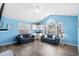 Spacious living room with vaulted ceiling, two sofas, mini bar, and abundant natural light at 6001- P16A S Kings Highway, Myrtle Beach, SC 29575
