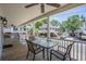 Spacious covered porch with outdoor seating, offering a relaxing space with neighborhood views at 6001- P16A S Kings Highway, Myrtle Beach, SC 29575