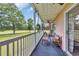 A cozy screened in balcony with chairs and small table offers a relaxing outdoor space at 627 Waterway Village Blvd. # 8E, Myrtle Beach, SC 29579
